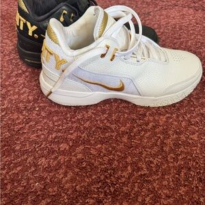 Nike White and Gold Sneakers